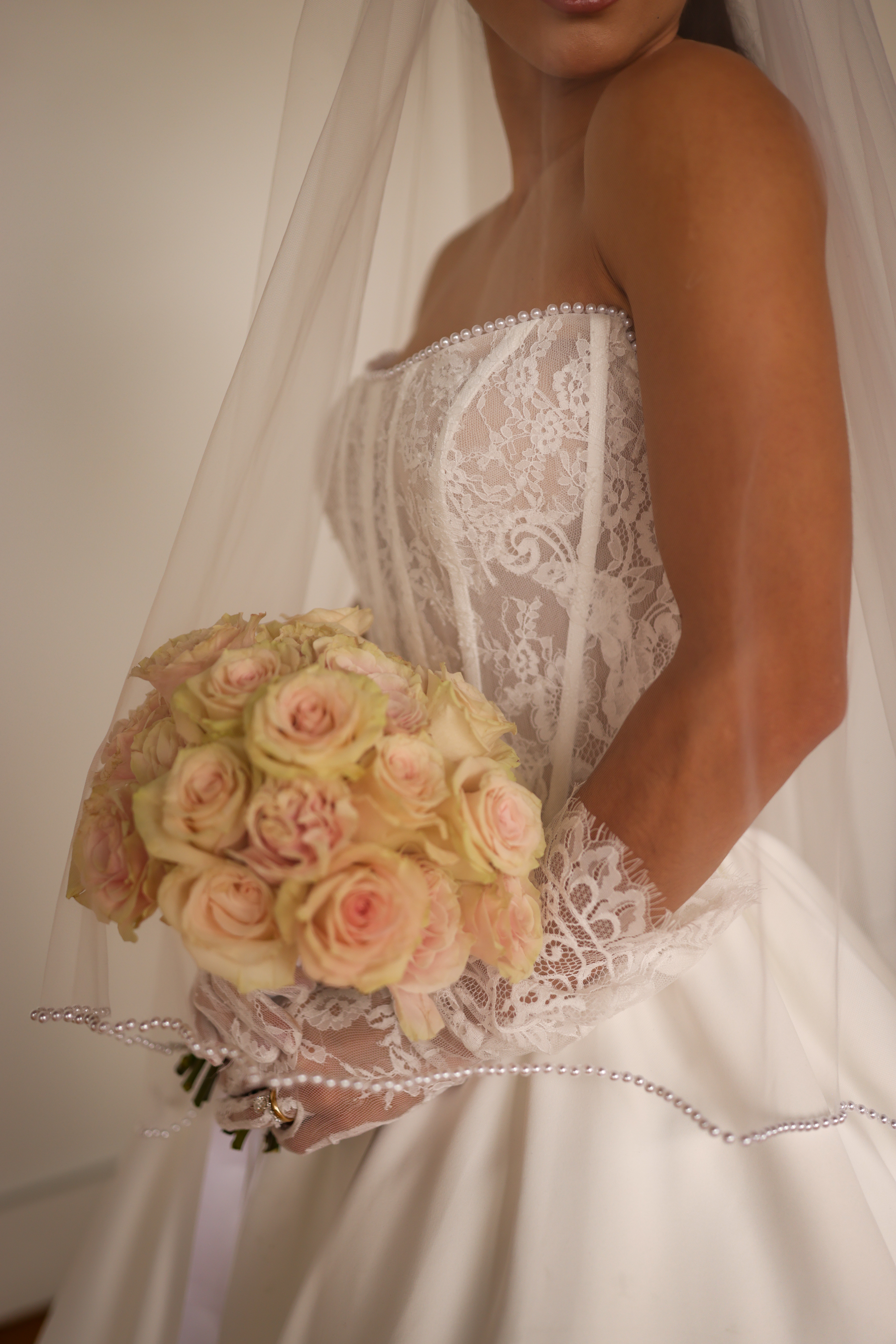 Elegant bride posing in a gown from the Bridals by Lori online collection